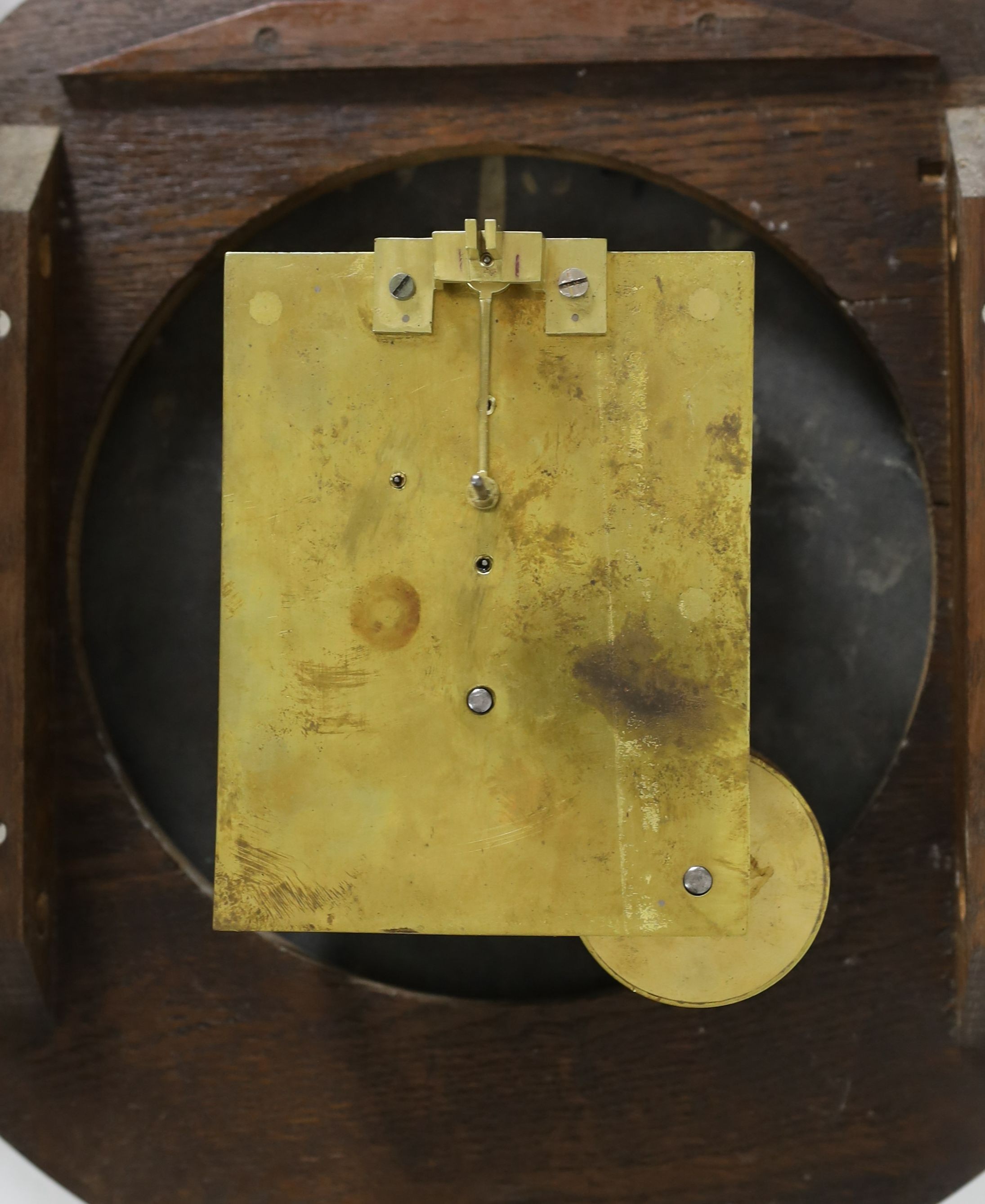 E. White, 20 Cockspur Street, London. A late Victorian oak cased wall timepiece, diameter 38cm